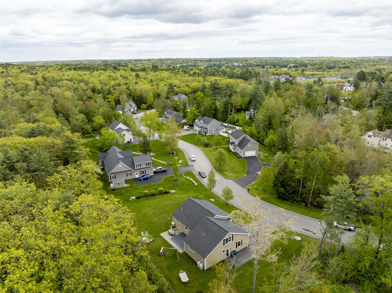 Aerial overview of a residential neighborhood in spring.